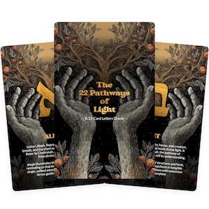 May include: Three oracle cards with a black background. The cards feature a detailed illustration of hands holding a tree with fruit. The text "The 22 Pathways of Light" and "A 22-Card Letters Oracle" are displayed on the center card.