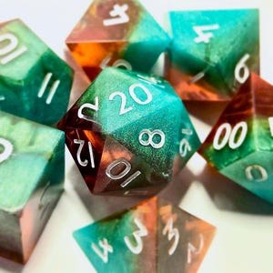 Sunset Tides Dice Set – Clear Orange and Teal Blue Swirled Dice with White Ink, Handmade Polyhedral RPG Dice for DnD and TTRPG Games