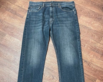 Vintage spijkerbroek | Retro Levi's 505 jeans met donkere wassing: 38 W en 34 l vintage denim