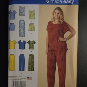 May include: Simplicity pattern 1446 FF for women's clothing, featuring a woman in a red patterned outfit. The pattern includes various top and bottom styles, with size information for US 18W-24W. The packaging also shows different clothing designs.