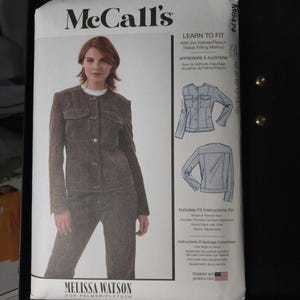 May include: McCall's sewing pattern M8474 featuring a woman in a brown jacket and pants. The pattern includes instructions for fitting adjustments. Designed and printed in the USA. Includes instructions for shoulder princess full bust adjustment and round back with yoke.