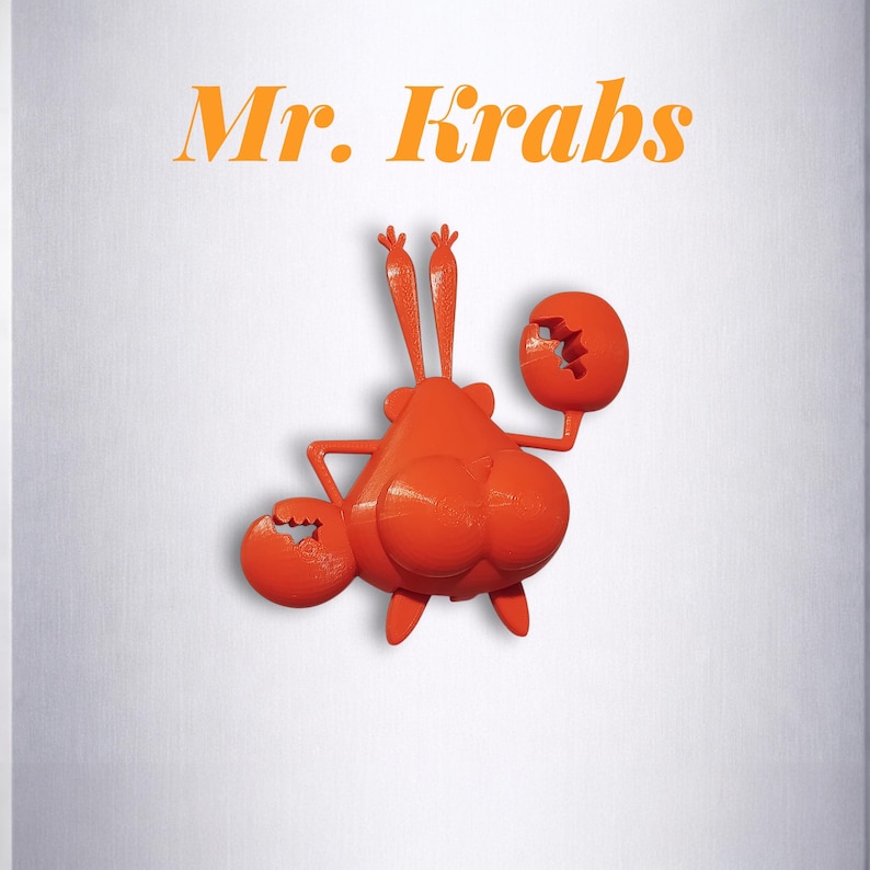 Puede incluir: Figura naranja impresa en 3D de Mr. Krabs de Bob Esponja. La figura tiene dos grandes pinzas, dos ojos y dos antenas. El texto "Mr. Krabs" est&aacute; encima de la figura en naranja.