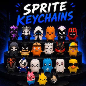May include: A collection of twenty small, stylised character figurines arranged on a tiered display. The text SPRITE KEYCHAINS is displayed in white and blue at the top. The figures feature various designs, including skulls, animals, and human-like characters in diverse colours and patterns, all standing on a dark, circular, multi-level platform.