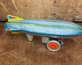 Vintage Schylling Zeppelin Blimp Wind-Up Tin Litho Toy - 1970’s - With American Flag - Working Condition