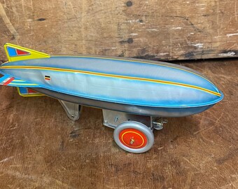 Vintage Schylling Zeppelin Blimp Wind-Up Tin Litho Toy - 1970's - Made in Korea - Working Condition - Belgium Flag