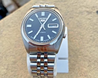 Vintage Seiko 5 automatisch horloge | Zwarte wijzerplaat | Dag-datum | Mechanisch herenhorloge
