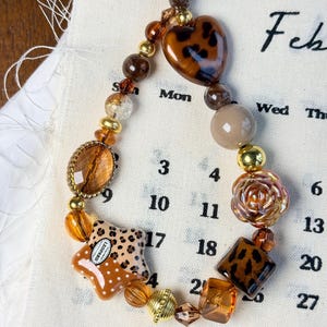 Personalized Handmade Maillard Phone Charm · Brown, Gold & Leopard Beaded Bag Charm · Warm Gift · Random Pattern Keychain Accessory
