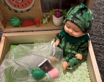 Interactive and playful Watermelon baby in a box