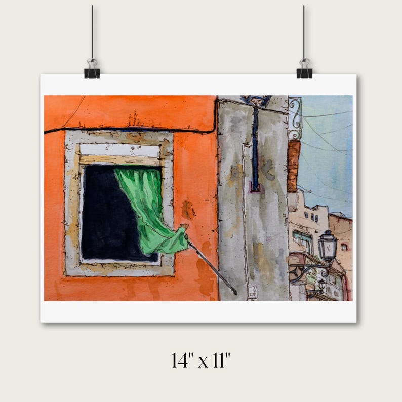 May include: A watercolor painting measuring 14 inches by 11 inches depicting an orange building facade with a window featuring a green curtain. A gray wall section, a black street lamp, and distant building outlines are visible in the scene.