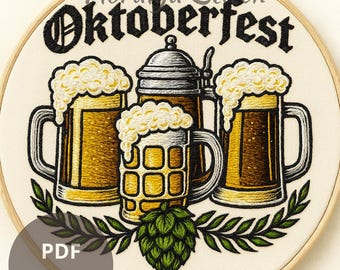 May include: Embroidered artwork in a wooden hoop features the word "Oktoberfest" above three beer steins with frothy foam. A hop and leaves are at the bottom. The text "PDF Pattern" is in a circle at the bottom left.