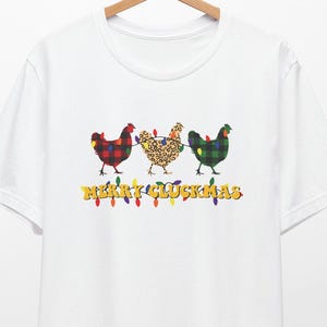 Grappig kerstshirt kip: T-shirt met buffelruit en luipaardduivin