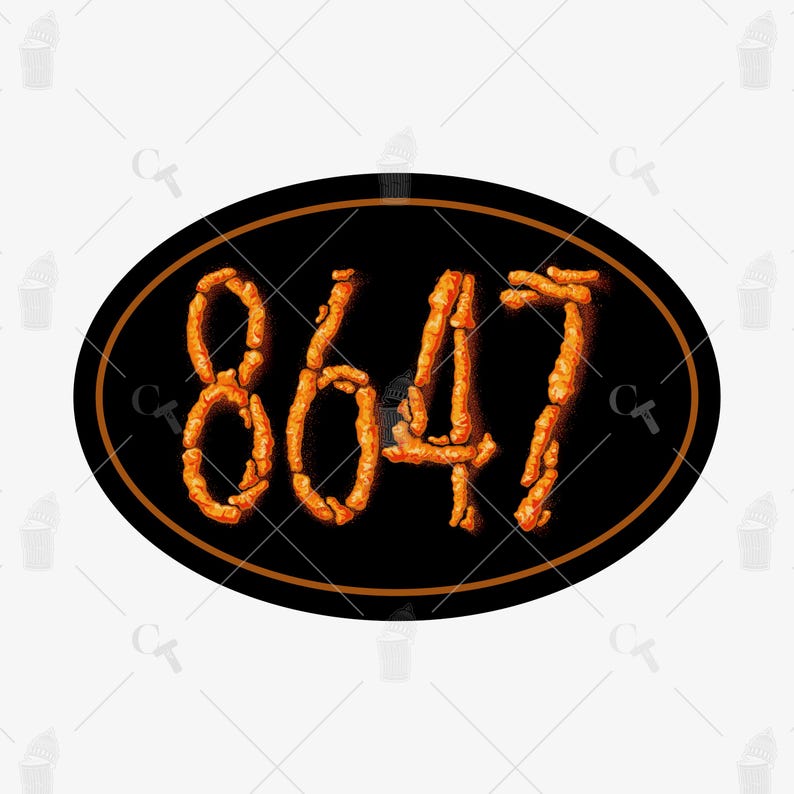 May include: An oval-shaped sign with the number "8647" in a fiery orange font against a black background. The sign has a thin, brown border and is likely a decorative item.