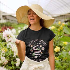 Keeper of Curious Creatures Shirt - Fantasy Theme Park Outfit - Magical Animal Tee with Snake Design - Creature Lover Gift - Women&#39;s Shirt