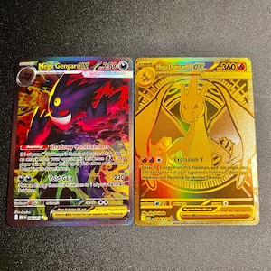 Könnte beinhalten: Ein Set aus drei Keramikbechern mit gesprenkelter, matter Oberfläche. Die Becher sind in Creme-, Hellgrau- und Dunkelgrautönen gehalten. Jeder Becher hat ein schlichtes, minimalistisches Design, perfekt für Kaffee oder Tee.