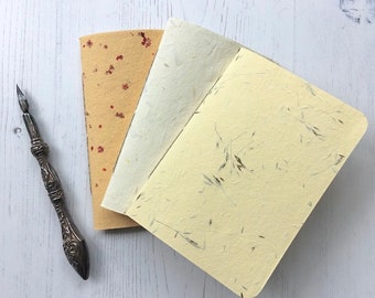 A6 handmade paper soft cover notebook, recycled pages with dots, lines, staves, blank journal