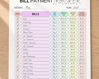 Op de afbeelding: Een afdrukbare maandelijkse factuurbetalingsorganizer met een witte achtergrond. De tracker bevat secties voor rekeningen, vervaldatums, bedragen en de betaalstatus. De tekst "Monthly Bill Pay Organizer" staat bovenaan.