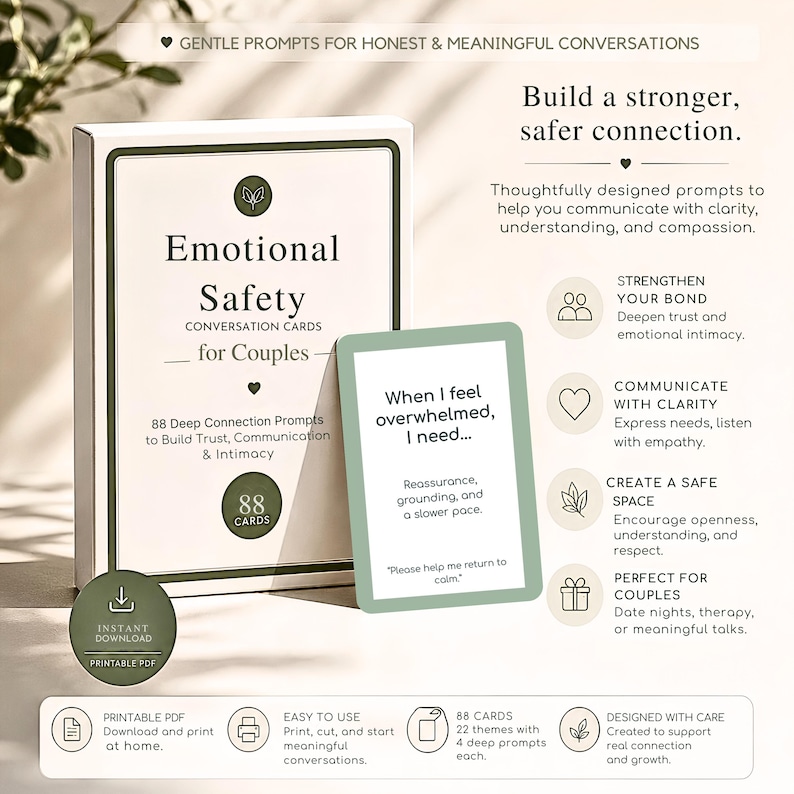 May include: A boxed set of "Emotional Safety Conversation Cards for Couples." The box and a single card are displayed, featuring text about building trust and communication. The card reads "When I feel overwhelmed, I need..." and includes prompts for deeper connection.