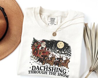 Dachshing Through The Snow T-shirt, Dachshund Christmas Tee, Cute Wiener Dog Lover Gift, Funny Santa Sleigh Holiday Shirt, Comfort Colors©