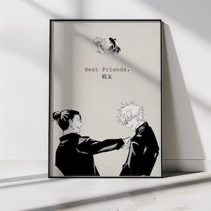 May include: Black and white framed art print featuring two anime characters fist bumping. The words "Best Friends" are above the Japanese characters for "Best Friends". Two stylized fish are at the top.
