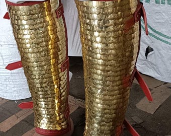 Medieval Scale Armor Greaves – Golden Leg Guards with Red Straps, Handmade Cosplay LARP Gear