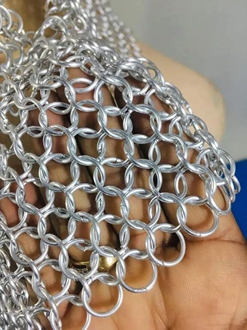 Adult-sized silver chainmail V-neck halter top, lightweight metal design, handmade for medieval warrior cosplay, LARP, and festival wear.