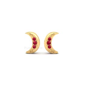 May include: A pair of gold-colored crescent moon earrings. Each earring features a row of three red gemstones and small circular accents along the curved edge. The earrings are set against a white background.