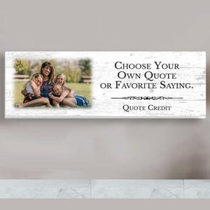 May include: A rectangular wooden sign with a family photo on the left and text on the right that reads "Choose Your Own Quote or Favorite Saying." The sign is displayed on a white shelf.