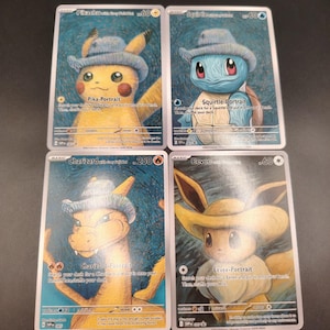 May include: Four rectangular trading cards featuring illustrations of Pikachu, Squirtle, Charizard, and Eevee. Each character wears a hat and is depicted in an impressionistic style with blue, textured backgrounds. Text on cards includes names and game stats.