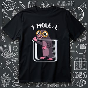 May include: Black t-shirt with a cartoon mole wearing glasses inside a beaker. The text "1 MOLE/L" is above the mole. The background is a chalkboard with science-related drawings.