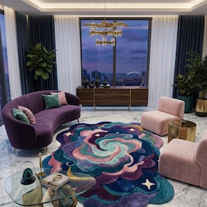 May include: A large, irregularly shaped area rug featuring a swirling, cloud-like pattern in shades of deep blue, purple, teal, and soft pink, accented with small white star shapes, positioned in a living room with a purple sofa and pink chairs.