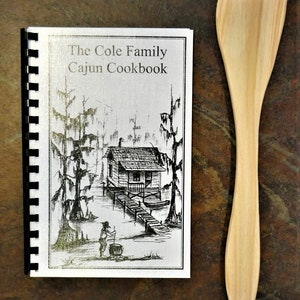 The Cole Family Cajun Cookbook with Rustic Hand Made Cypress Wood Roux Stick