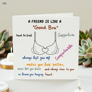 May include: A white greeting card with the text "A FRIEND IS LIKE A 'Good Bra'" and a bra illustration. The card includes phrases like "hard to find," "supportive," and "comfortable."