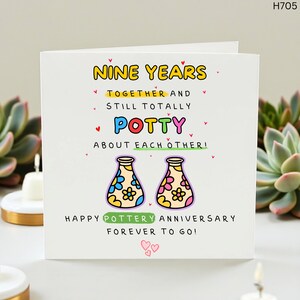 May include: A white greeting card with the text "NINE YEARS" in yellow, "TOGETHER AND STILL TOTALLY POTTY ABOUT EACH OTHER!" in various colors, and "HAPPY POTTERY ANNIVERSARY FOREVER TO GO!" in green. Two illustrated pottery vases are featured.