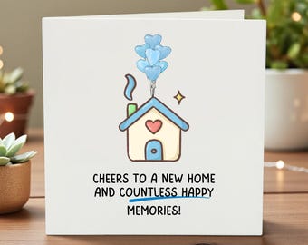 May include: A white greeting card with a cartoon house illustration. The house has a blue roof, a heart-shaped window, and a door. Blue heart-shaped balloons float above the house. The text reads, "Cheers to a new home and countless happy memories!"