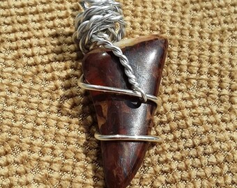 Striking red jasper wrapped with silver wire