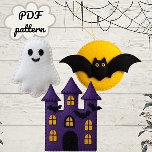 May include: A collection of felt Halloween decorations, including a white ghost with a smiling face, a black bat in front of a yellow moon, and a purple castle with bats. The words "PDF pattern" are in a cloud-shaped bubble.