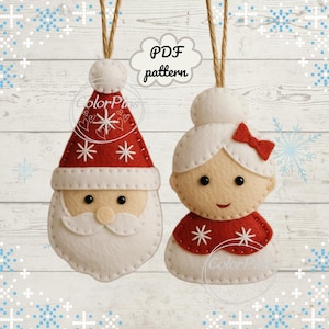 May include: Felt Christmas decorations depicting Santa Claus and Mrs. Claus. Santa wears a red hat with white snowflakes, a white beard, and black eyes. Mrs. Claus has a red bow and a red collar with white snowflakes. The ornaments hang from twine.