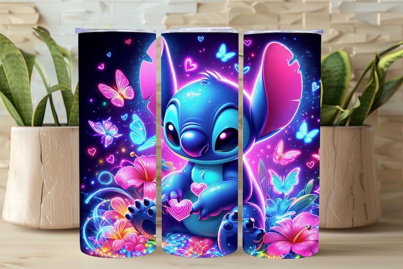 May include: A tumbler featuring a vibrant design of a blue cartoon character with large ears, surrounded by neon butterflies, hearts, and flowers. The background is a gradient of purple and pink, creating a whimsical and colorful aesthetic.