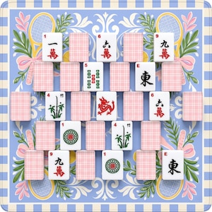 May include: A Mahjong set displayed on a blue and white patterned mat. The tiles feature Chinese characters and symbols in red, green, and black. Pink plaid tiles are interspersed between the game tiles. The mat has tennis rackets and floral designs.