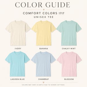 May include: A colour guide for Comfort Colors 1717 unisex tees. The image shows six t-shirts in different colours: ivory, banana, chalky mint, lagoon blue, chambray, and blossom. The text at the bottom states that colours may vary slightly due to screen settings.
