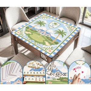 May include: A wooden game table with a golf course design on the tabletop. The table features a green golf course scene with palm trees, a blue sky, and a coastal background. The table is surrounded by four chairs.