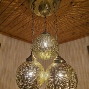 The brass lamp safely packaged, perfect for a wedding or housewarming gift.