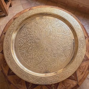 "Modern minimalist interior styled with a vintage Moroccan brass tray."