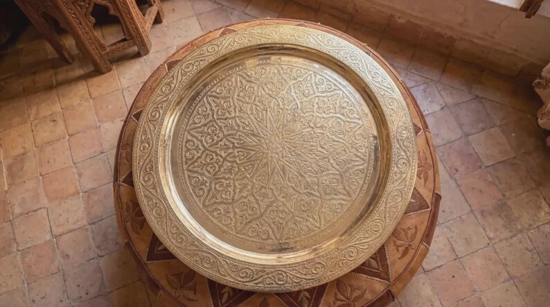 "Modern minimalist interior styled with a vintage Moroccan brass tray."