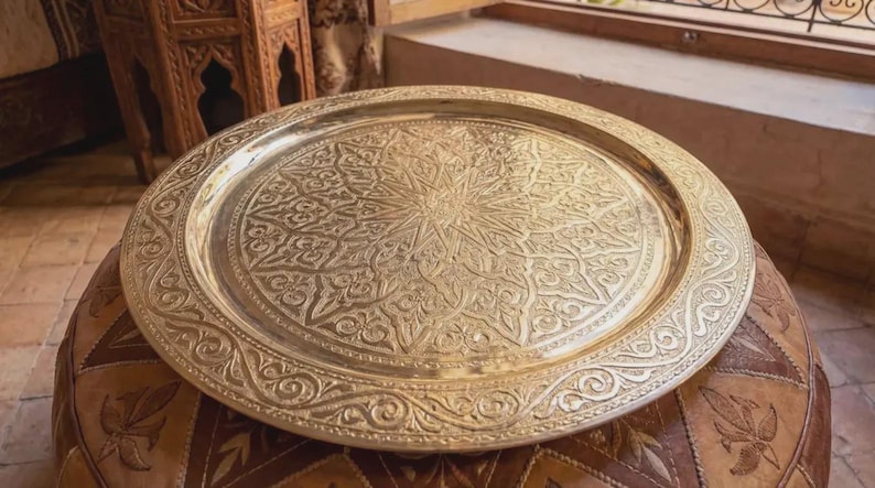 "Moroccan tray table setup with a wooden folding stand (stand sold separately)."