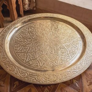 "Solid brass tray packaged in eco-friendly wrapping for shipping."