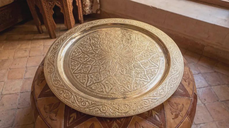 "Solid brass tray packaged in eco-friendly wrapping for shipping."