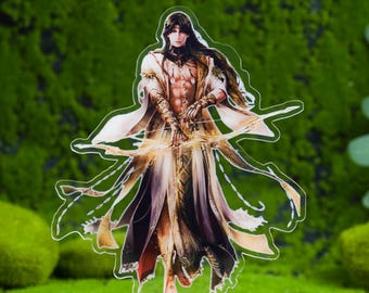 May include: A clear acrylic figure of a long-haired character in flowing robes, holding a bow. The figure is detailed with shades of white, gold, and brown, and stands on a wooden base. The background is a green mossy texture.