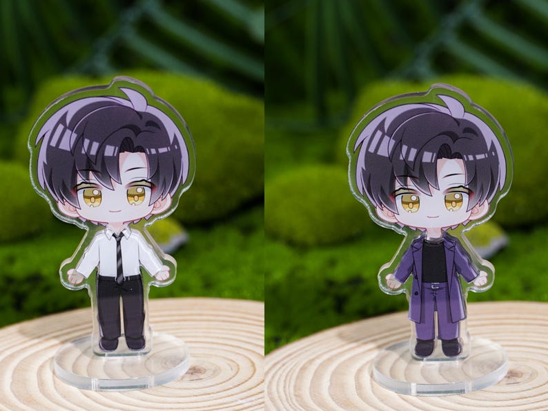 May include: Two acrylic anime-style figures of a male character with black hair and yellow eyes. One figure wears a white shirt, black pants, and a tie. The other figure wears a purple suit. Both figures stand on clear circular bases.