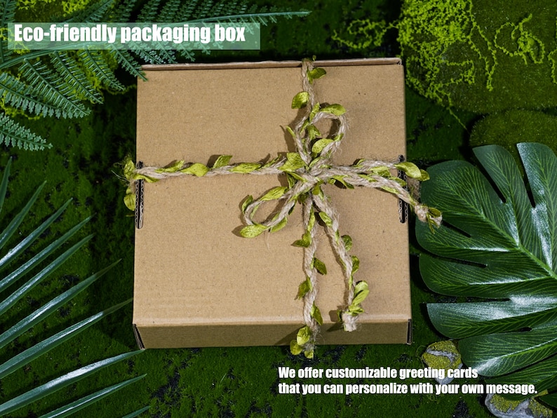 May include: A brown eco-friendly packaging box tied with twine and adorned with green leaf accents. The box is surrounded by green foliage. Text on the image reads: "Eco-friendly packaging box" and "We offer customizable greeting cards that you can personalize with your own message."